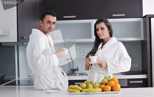 Image of young couple have fun in modern kitchen