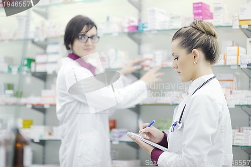 Image of team of pharmacist chemist woman  in pharmacy drugstore