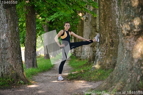 Image of woman stretching before fitness