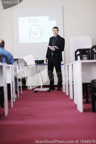 Image of business man on seminar