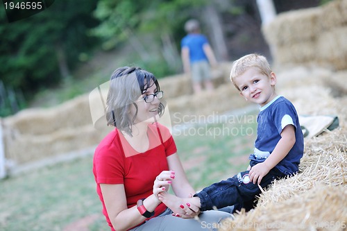 Image of woman and child have fun outdoor