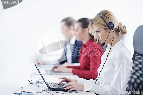 Image of business woman group with headphones