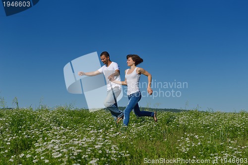 Image of happy couple in wheat field