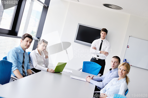 Image of business people in a meeting at office