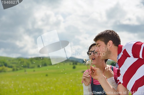 Image of romantic young couple in love together outdoor