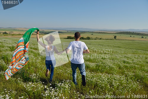 Image of happy couple in wheat field