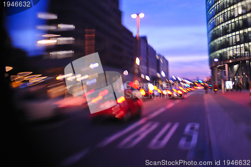 Image of City night with cars motion blurred light in busy street