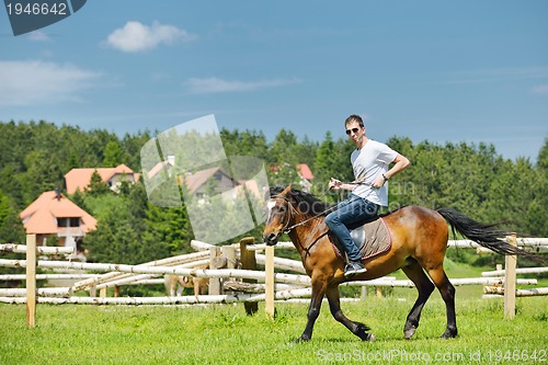 Image of man ride horse