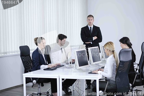 Image of business people group working in customer and help desk office