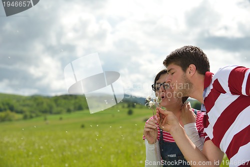 Image of romantic young couple in love together outdoor