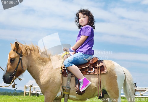 Image of child ride pony