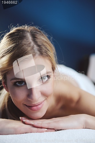 Image of Beautiful young woman in spa