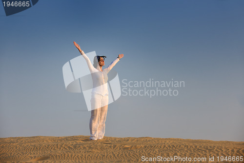 Image of woman relax in desert