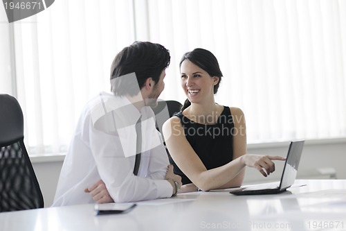 Image of business people in a meeting at office
