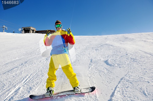 Image of skiing on fresh snow at winter season at beautiful sunny day