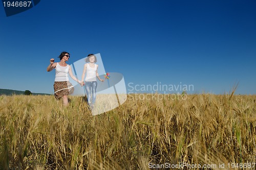Image of happy couple in wheat field
