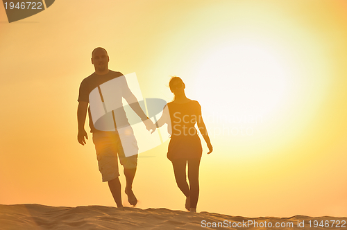 Image of couple enjoying the sunset