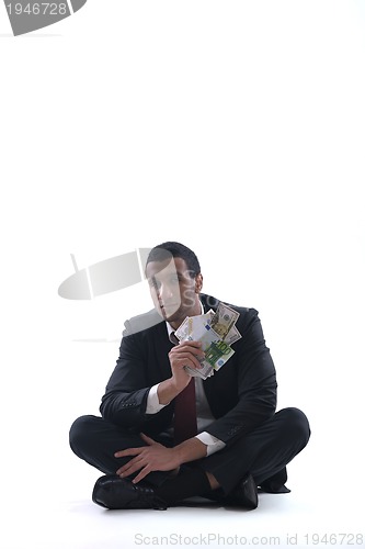 Image of Business man holding money