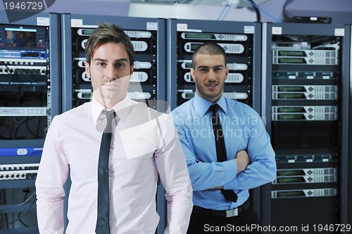 Image of it enineers in network server room