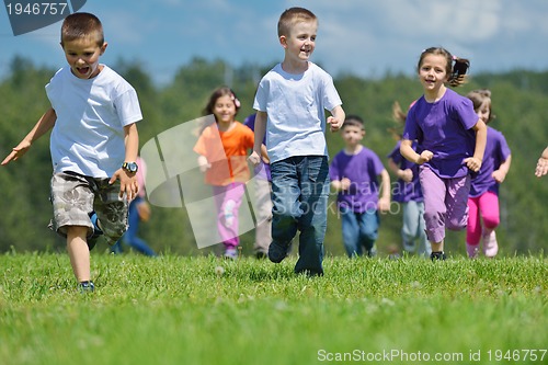 Image of happy kids group  have fun in nature