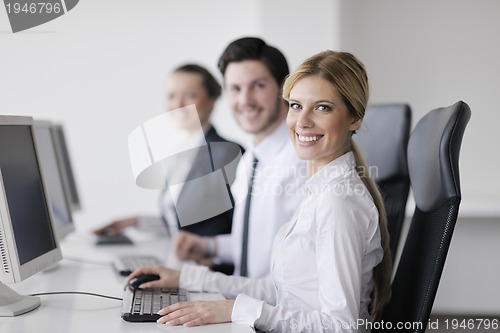 Image of business people group working in customer and help desk office