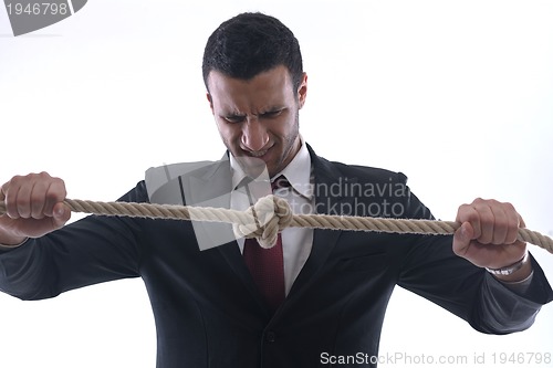 Image of business man with rope isolated on white background
