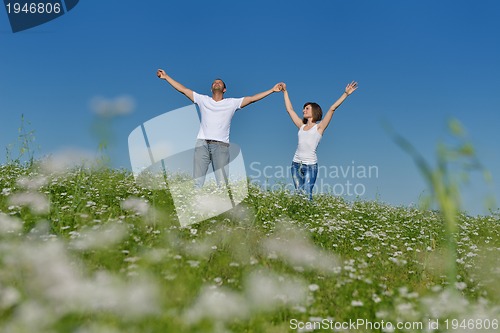 Image of happy couple in wheat field