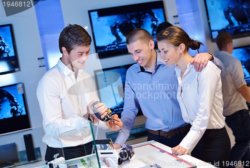 Image of people buy  in consumer electronics store