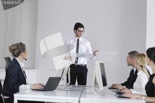 Image of business people group working in customer and help desk office