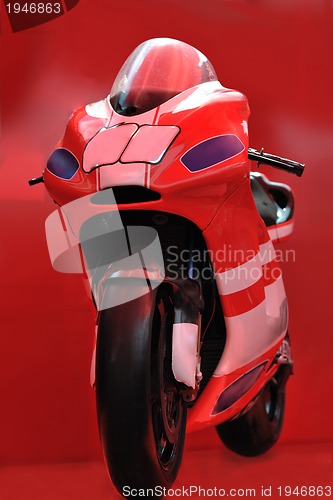 Image of red motor bike