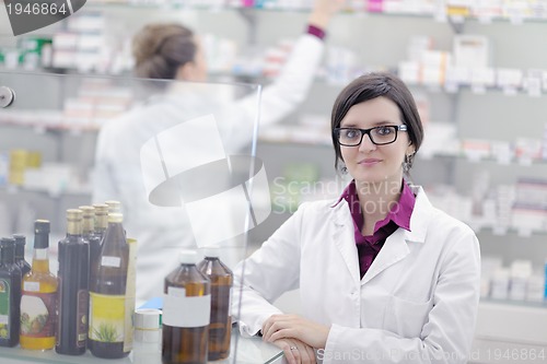 Image of team of pharmacist chemist woman  in pharmacy drugstore