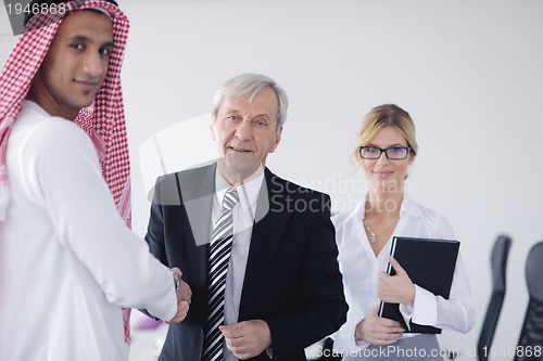 Image of Arabic business man at meeting