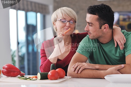 Image of young couple have fun in modern kitchen