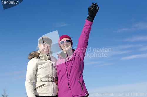 Image of winter season fun with group of girls