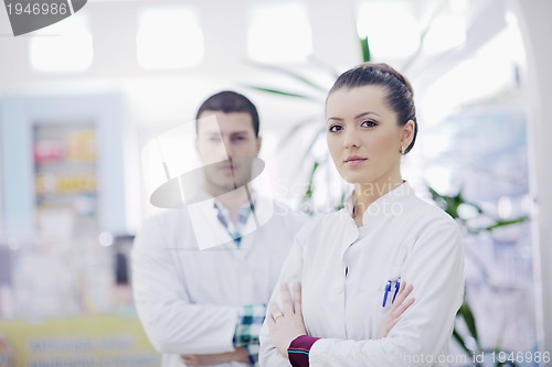 Image of team of pharmacist chemist woman  in pharmacy drugstore
