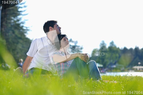 Image of romantic young couple in love together outdoor