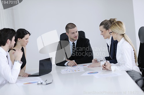 Image of business people in a meeting at office