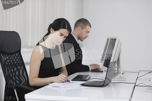 Image of business people group working in customer and help desk office