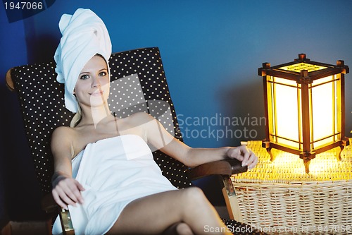 Image of Beautiful young woman in spa