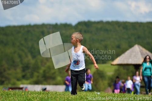 Image of happy kids group  have fun in nature