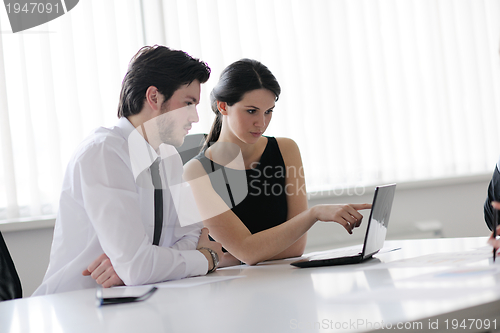 Image of business people in a meeting at office