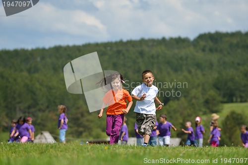 Image of happy kids group  have fun in nature