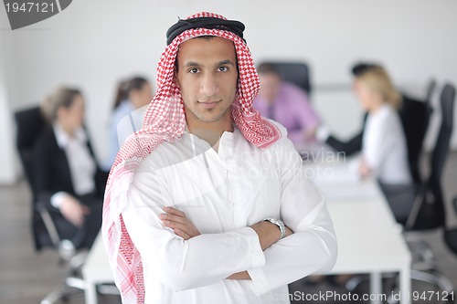 Image of Arabic business man at meeting