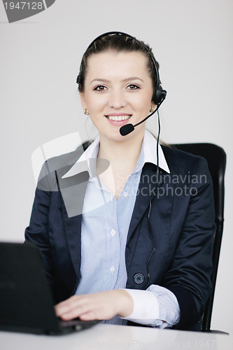 Image of business woman group with headphones