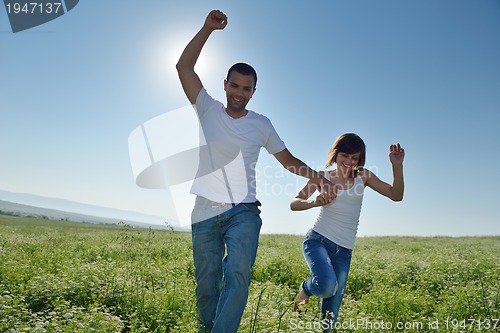 Image of happy couple in wheat field