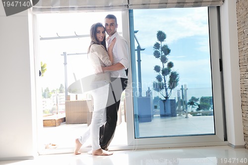 Image of happy young couple relax at home