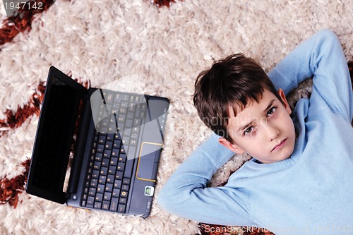 Image of happy boy at home relax
