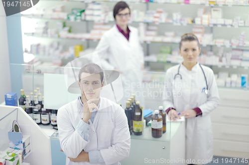 Image of team of pharmacist chemist woman  in pharmacy drugstore