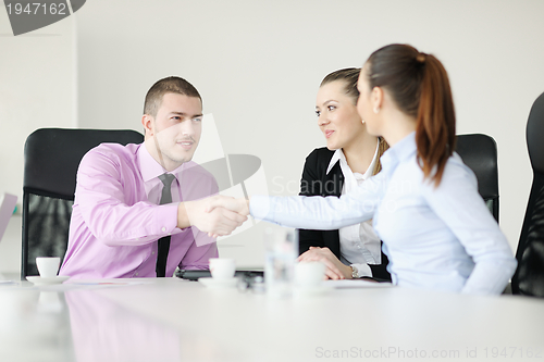 Image of Group of young business people at meeting