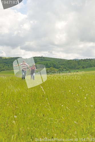 Image of romantic young couple in love together outdoor
